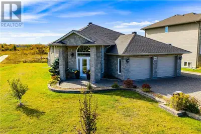 Welcome to this gorgeous all brick and stone custom bungalow. Here in the heart of Chelmsford this h...
