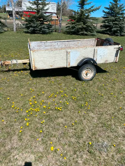 Utility Trailer Home Made 4x8 Pull great 12 inch tires 1-7/8 inch ball hitch $600.00 Call 403-831-41...