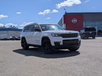 This pre-owned 2024 Jeep Grand Cherokee L Limited is finished in Bright White with a refined Global... (image 1)