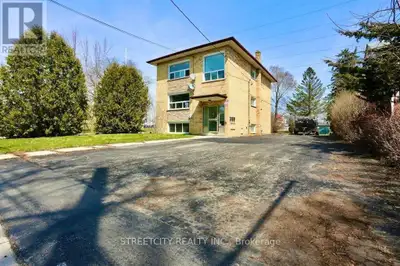 Legal TRIPLEX. Annual Income $74,352++ ROI 7%++Spacious TWO 3 bedroom units + 1 2 Bedroom unit, upda...