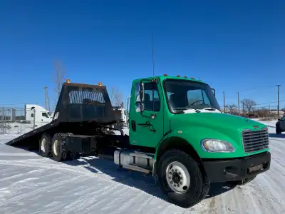 Located in wpg. 2004 Freightliner M2 Roll Back 28' and 2006 M2 Hiab Crane Truck with 2016 rotator +...