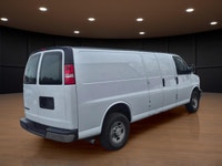 The 2020 Chevrolet Express Cargo Van 2500 Extended Wheelbase in a clean White finish, paired with re... (image 5)