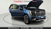The 2025 GMC Yukon Elevation combines bold styling, spacious versatility and powerful performance in... (image 6)