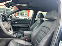 The 2024 Honda CR-V Hybrid EX-L in stunning Canyon River Blue Metallic offers an unparalleled blend... (image 8)