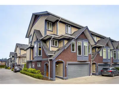 Welcome to this stunning end-unit in desirable BELCROFT complex in South Surrey. This rarely availab...