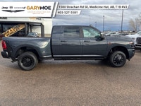 Experience the power and finesse of the 2026 Ram 3500 Laramie 4x4 Mega Cab, cloaked in a bold blue t... (image 1)