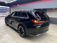 The 2024 Mazda CX-90 PHEV GT in a stunning black finish offers the perfect blend of luxurious style... (image 3)