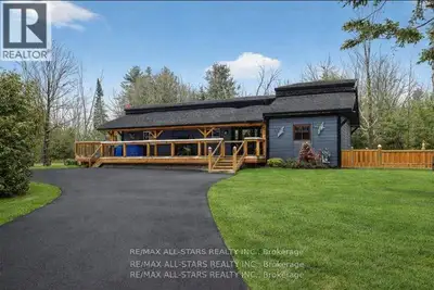 Welcome to this one-of-a-kind post-and-beam home, rich in character and warmth, set on approximately...