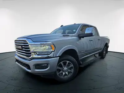 Introducing the powerful 2023 Ram 3500 Limited Longhorn in a eye-catching silver color, boasting a 4...