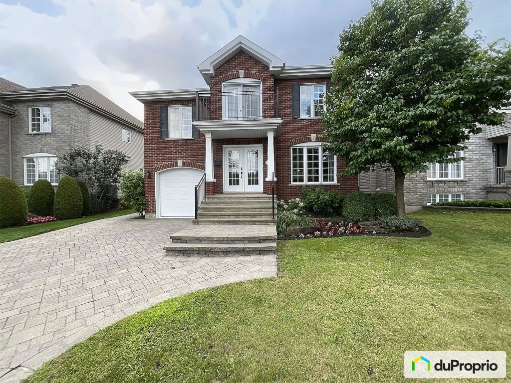 $979,500 - 2 Storey for sale in Ste-Rose — photo 1