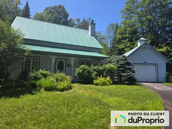 $590,000 - Bungalow for sale in St-Jérôme (Bellefeuille) — photo 1