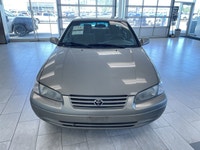 The 1998 Toyota Camry is a fuel-efficient midsize sedan known for its long-lasting durability, smoot... (image 5)