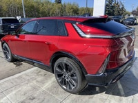 The 2026 Cadillac LYRIQ Signature Sport, finished in Radiant Red Tintcoat with a refined Oxford Ston... (image 5)