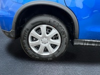 Meet the 2026 Mitsubishi RVR ES, a blue-front-wheel drive SUV that delivers confident handling and a... (image 8)