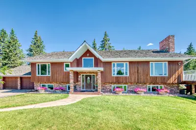 Unique 37+ acre country retreat between Ponoka & Lacombe! Stunning 2319 sq. ft. home with walk-out b...