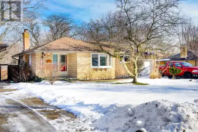 Welcome to 493 Cypress Avenue-a cherished 3-bedroom, 2-bathroom detached brick bungalow set in one o...