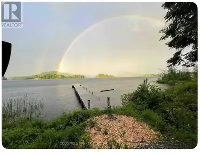 Welcome to your blank-canvas escape on beautiful Baptiste Lake. Set on approximately 1.07 acres, thi...