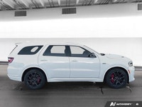 Experience the commanding performance, aggressive styling, and premium capability of the *2022 Dodge... (image 6)