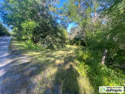 SAINT SAUVEUR , SECTEUR RECHERCHÉ VENTE TERRAIN CONSTRUCTIBLE 6000 M² , BOISÉ , BORD DE L'EAU , RIVI...