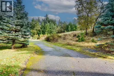 Peaceful Building Lot in Sought-After Nanoose Bay Welcome to 2310 Garry Oak Drive, a tranquil parcel...