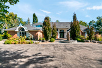 Beautiful  Retreat on 4 Acres with Three Car Garage