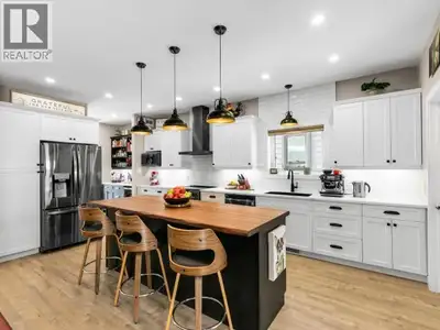 A custom build where function meets refined elegance, this 2,512 sq. ft. Whistle Bend home delivers...