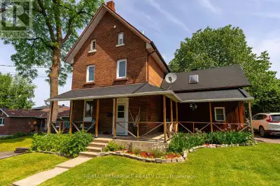 Charming Brick Farmhouse in the Heart of Pembroke, Welcome to this stately, three-story brick farmho...