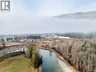 Discover 27 acres of flat, farmable land with over 800 ft of river frontage on the Eagle River. Appr...