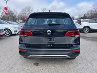 The 2024 Volkswagen Taos Comfortline is a compact SUV that offers a great balance of efficiency, pra... (image 5)