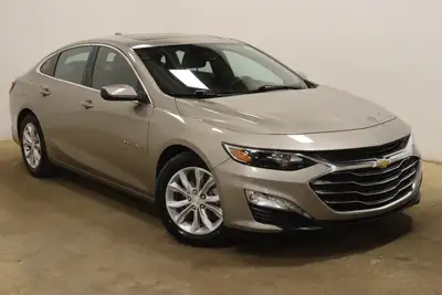 Experience the sophistication of the 2022 Chevrolet Malibu LT in a striking brown finish with front-...
