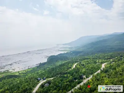 Terrain constructible avec potentiel locatif court terme (Airbnb). Petite-Rivière-Saint-François, Ch...