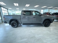 The 2023 Ram 1500 Rebel with the 5.7L HEMI V8 eTorque engine is the perfect blend of off-road capabi... (image 6)