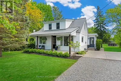 1.46 acres of pure paradise in Fenwick! Live your best country life on this property that includes a...