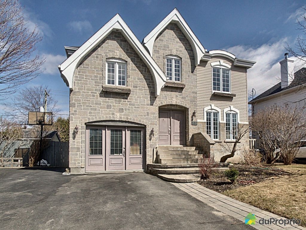 $979,999 - Split Level for sale in Fabreville — photo 1