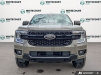 Experience the thrill of the new 2026 Ford Ranger LARIAT in a sophisticated gray finish, equipped wi... (image 2)