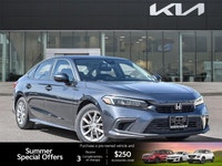 The 2022 Honda Civic Sedan EX, a striking grey 4-door car with a comfortable black interior, redefin... (image 7)