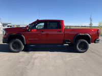 AMVIC Licensed Dealer The 2026 GMC Sierra HD AT4X AEV Edition in Volcanic Red Tintcoat is engineered... (image 4)