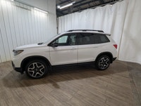 Experience the perfect blend of elegance and performance with the 2023 Honda Passport Touring AWD, d... (image 3)