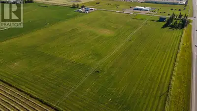DEVELOPMENT LAND FOR SALE – SO MANY POSSIBILITIES! This 20 ACRE PARCEL of land is presently zoned ag...