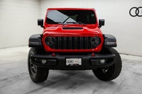Why buy new? Save over $14,900 + tax from new on this ultra low KM 2026 Jeep Wrangler 4-Door 4x4 Rub... (image 1)