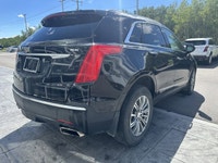 The 2019 Cadillac XT5 Luxury AWD, finished in black with a black leather interior, offers a refined... (image 7)