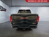 The 2024 GMC Sierra 1500 AT4 Crew Cab Short Box 4WDblends premium craftsmanship, rugged off-road cap... (image 5)