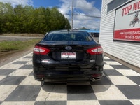 A comfortable midsize sedan with refined styling, modern convenience features, and efficient perform... (image 4)