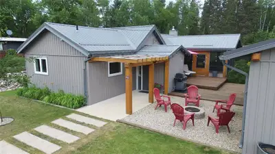 R36//Erickson/Rustic elegance meets modern comfort at this exceptional year-round retreat on approxi...