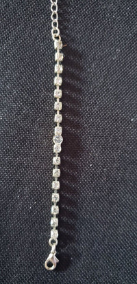 Rhinestone with one cubic zir. bracelet, 8", Silver plated.