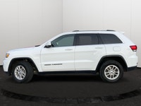 Used 2020 Jeep Grand Cherokee Laredo 4x4 for Sale in Edmonton, AB | Bright White Exterior | 136,982... (image 1)