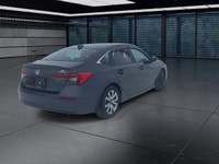 The 2024 Honda Civic Sedan LX-B CVT in sophisticated gray combines front-wheel drive with precise ha... (image 7)