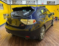 This impressive 2011 Subaru Impreza WRX STI is proudly offered by Auto Avenue Airdrie. Built for dri... (image 4)
