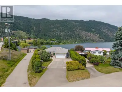 Waterfront paradise with 78' of prime water access on Little Shuswap Lake! This 3 bedroom, 3 bath ho...
