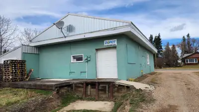 COMMERCIAL PROPERTY in Elk Point consisting of a well-maintained 1680 sq.ft. building, an attached 6...